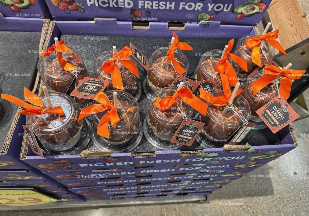 A Tray Of Chocolate Covered Caramel Apples With Roasted Peanuts