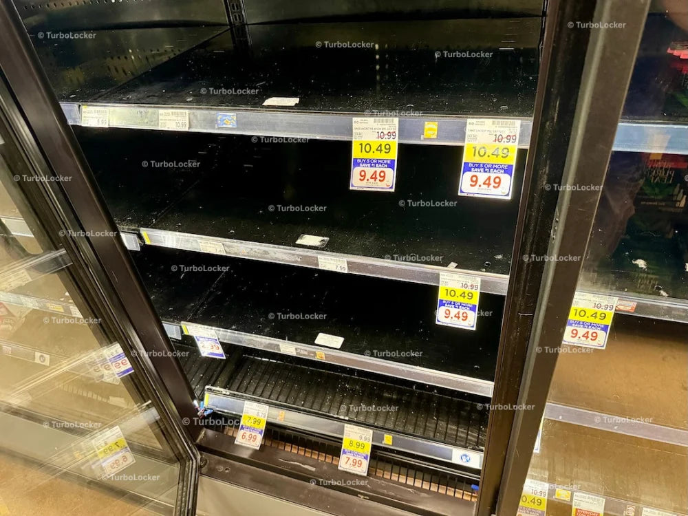 Empty Freezer Shelving At A Grocery Store