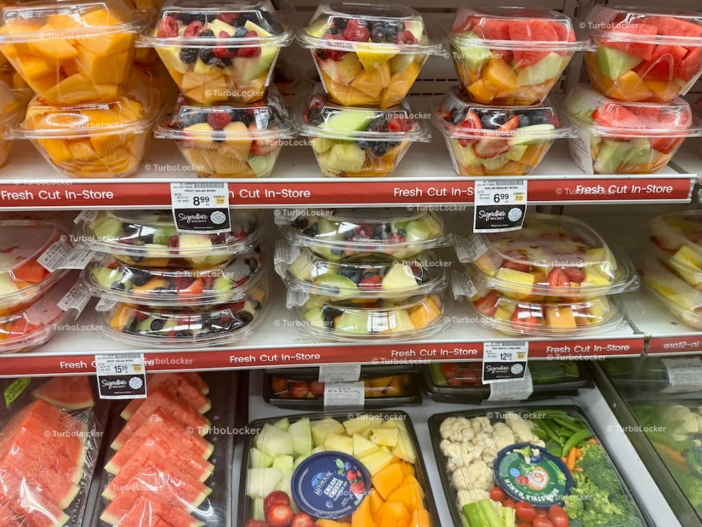 Fresh Fruit Containers At A Grocery Store Refrigerator
