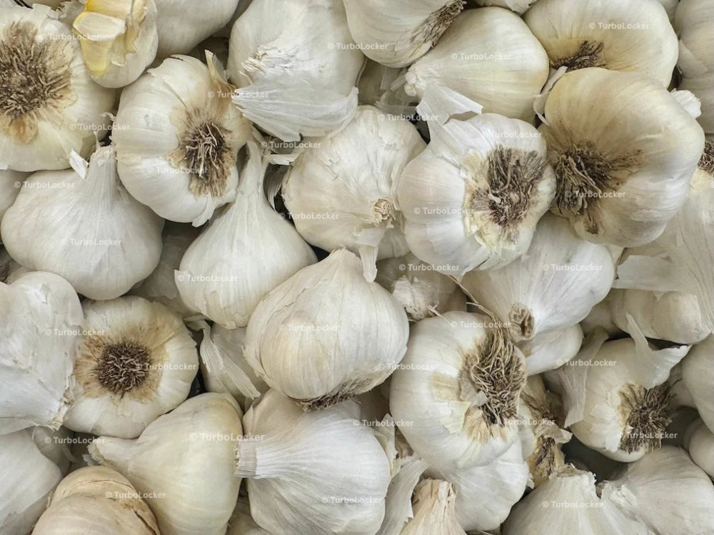 Garlic Cloves In A Grocery Department Bin